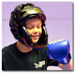 smiling child during a self defence class for children